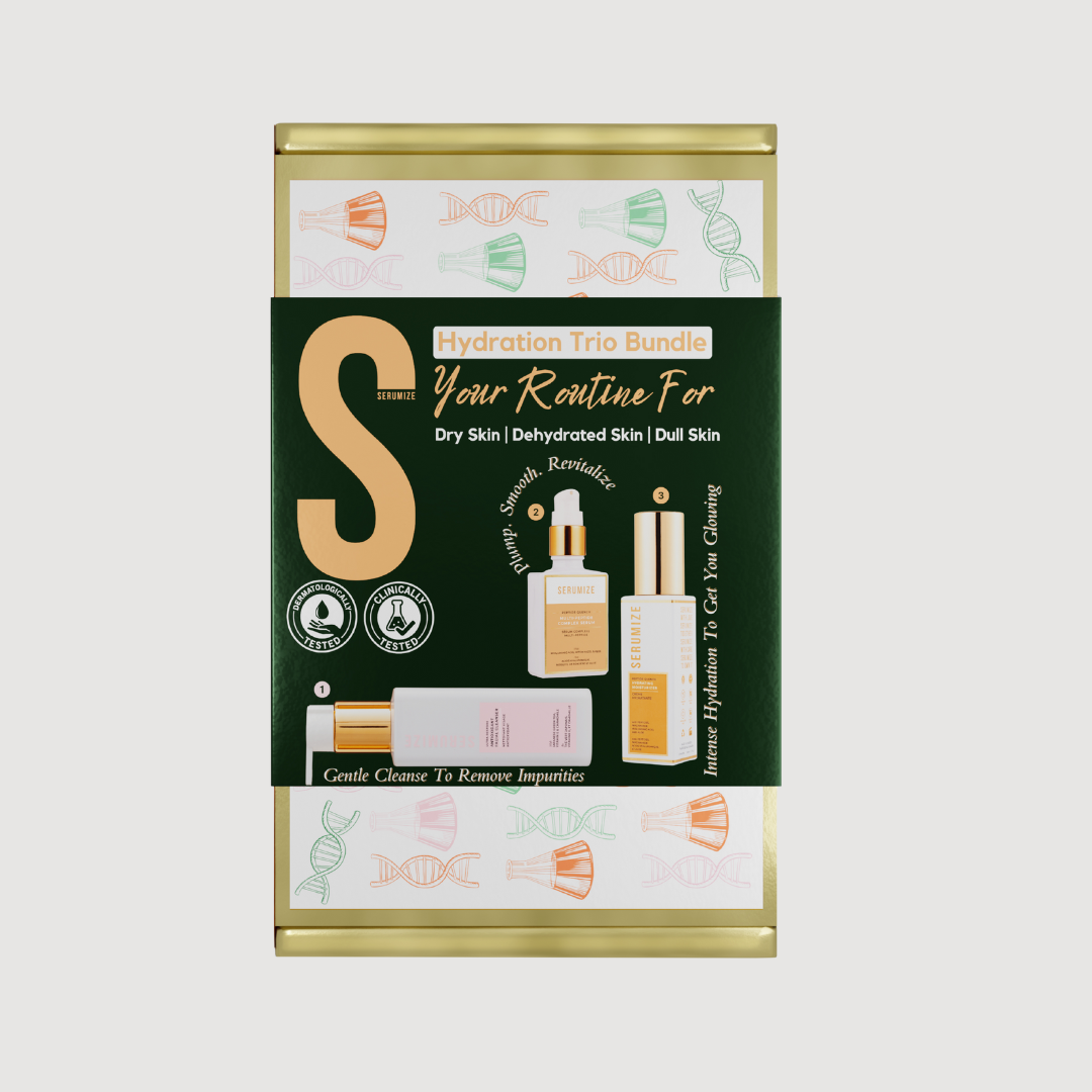 Skincare product packaging with gold and green design on a white background